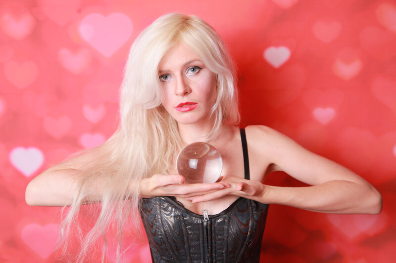 pretty-blonde-woman-holding-huge-ball